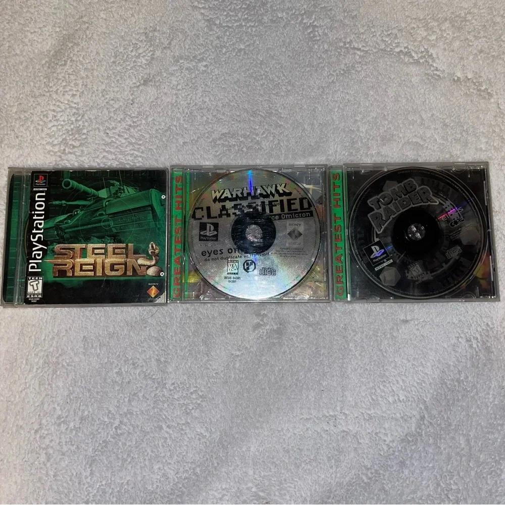Vintage Sony play station Game Collection - Steel Reign, Warhawk, Tomb Raider